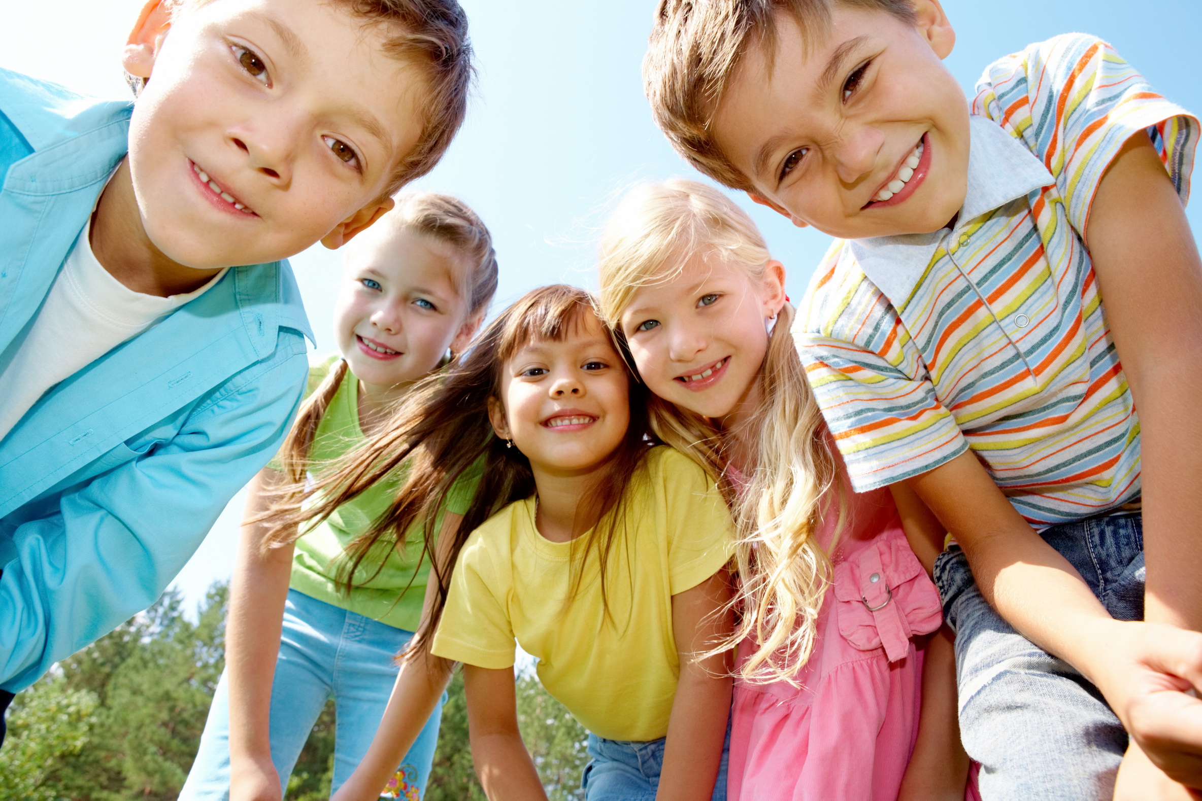 Portrait of happy kids outdoor looking at camera